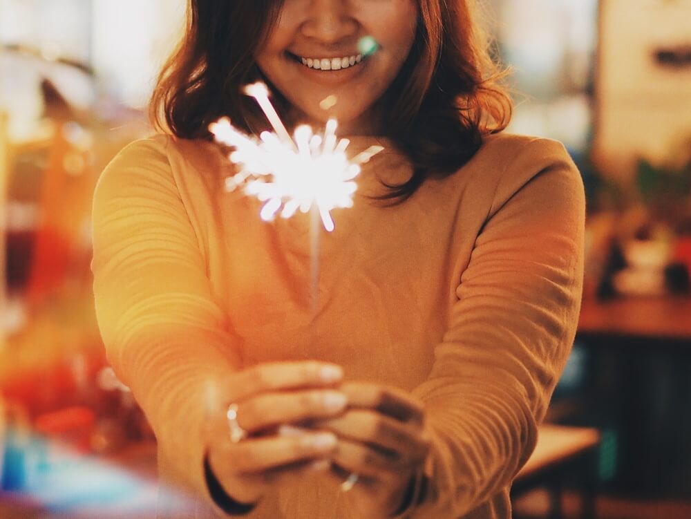 Girl holding a sparkler